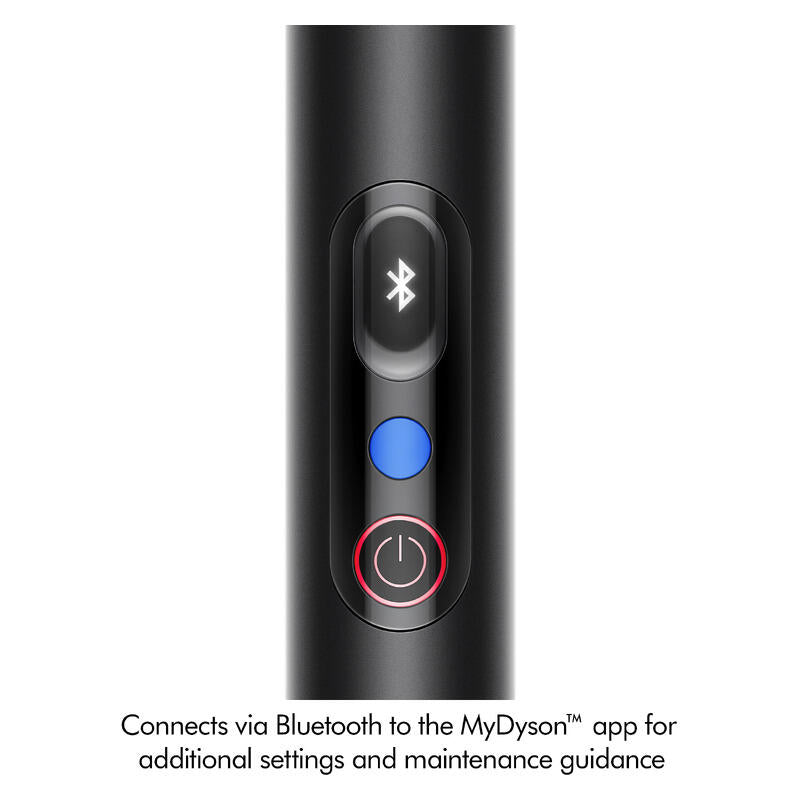 Close-up of a black cylindrical electronic device with a Bluetooth symbol button, a blue button, and a power button, with text below stating it connects via Bluetooth to the MyDyson app.