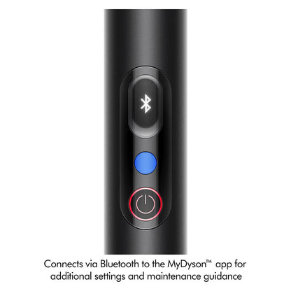 Close-up of a black cylindrical electronic device with a Bluetooth symbol button, a blue button, and a power button, with text below stating it connects via Bluetooth to the MyDyson app.