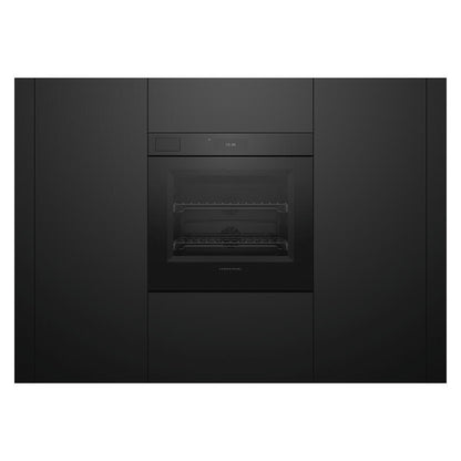 A sleek, black built-in wall oven integrated into matching black kitchen cabinetry, shown from a front-facing perspective against a white background.