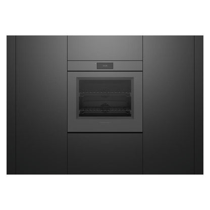 A built-in oven or wall oven integrated into a dark charcoal gray kitchen cabinet, shown from a front-facing perspective against a white background.
