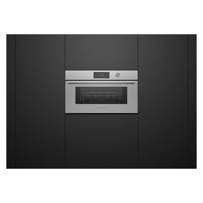 A built-in stainless steel oven with a digital control panel and glass door, set into a modern black kitchen cabinet.