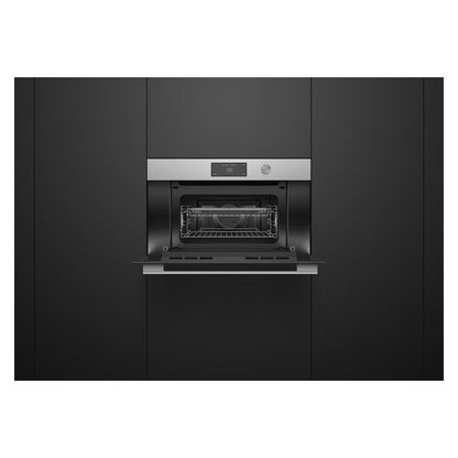 A built-in wall oven with a stainless steel control panel and open door, set into dark charcoal kitchen cabinets.