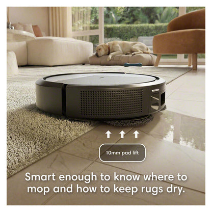 A round robotic vacuum cleaner mopping a light beige rug in a modern living room, with a dog sleeping on a cushion in the background. White text at the bottom reads 'Smart enough to know where to mop and how to keep rugs dry.