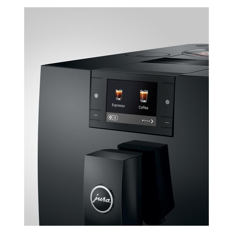A close-up of a black Jura coffee machine showing its digital touch screen with espresso and coffee options, and the Jura logo on the dispensing tower, set against a neutral gray background.