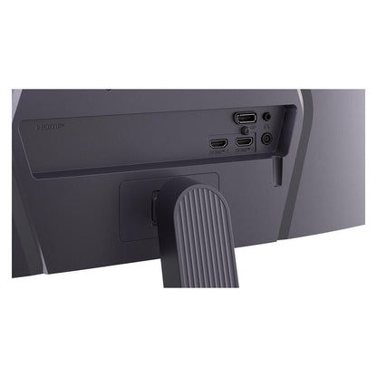 Close-up of the rear port area of a dark gray computer monitor, showing HDMI and audio jacks, with part of the stand visible against a white background.