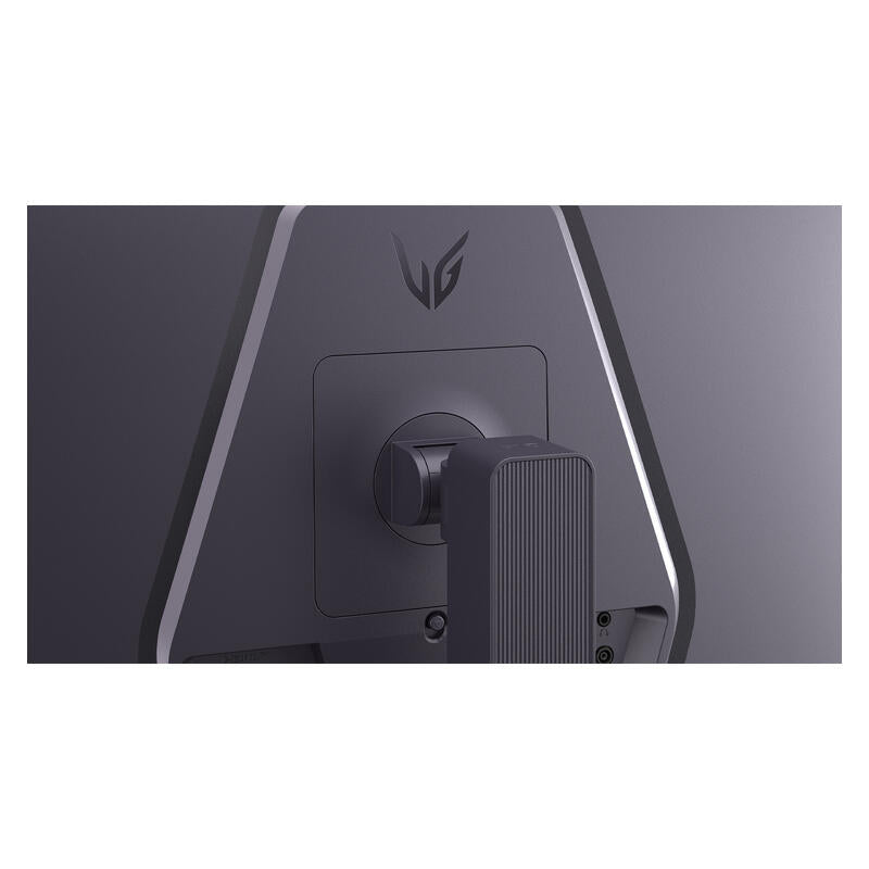 Close-up of the back of a dark gray gaming monitor showing the hinge, stand, and a stylized logo on the upper section.