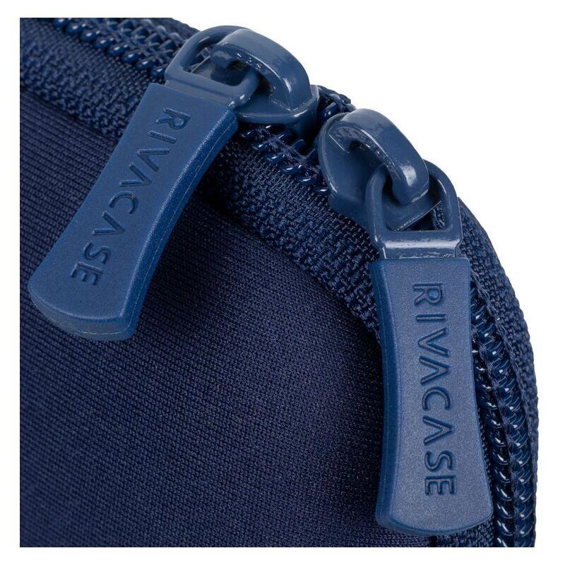 Close-up of a navy blue fabric zippered pouch with matching plastic zipper pulls embossed with the brand name RIVACASE.