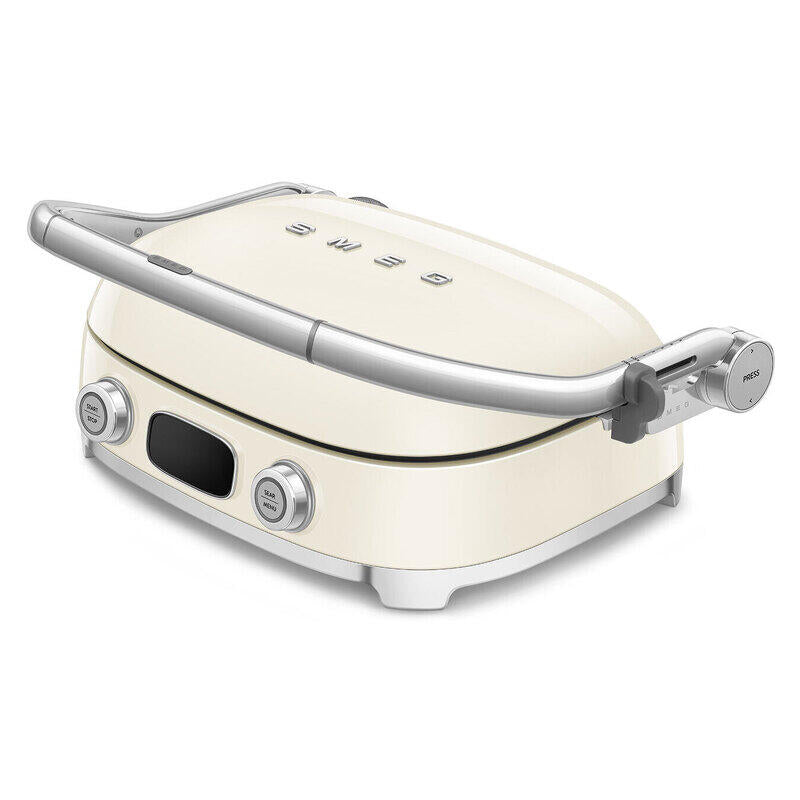 A Smeg retro-style electric grill in cream with silver metal accents, shown closed on a clean white background.