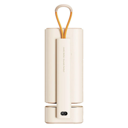 rear view of a Yaber portable projector that is cream in colour on a white background.